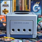 Nintendo GameCube console with colorful games displayed around it, professional studio lighting, gaming collection aesthetic, no text or UI elements visible