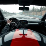 Professional racing driver in high-speed sports car on wet track with motion blur, photorealistic, dynamic lighting, no UI elements